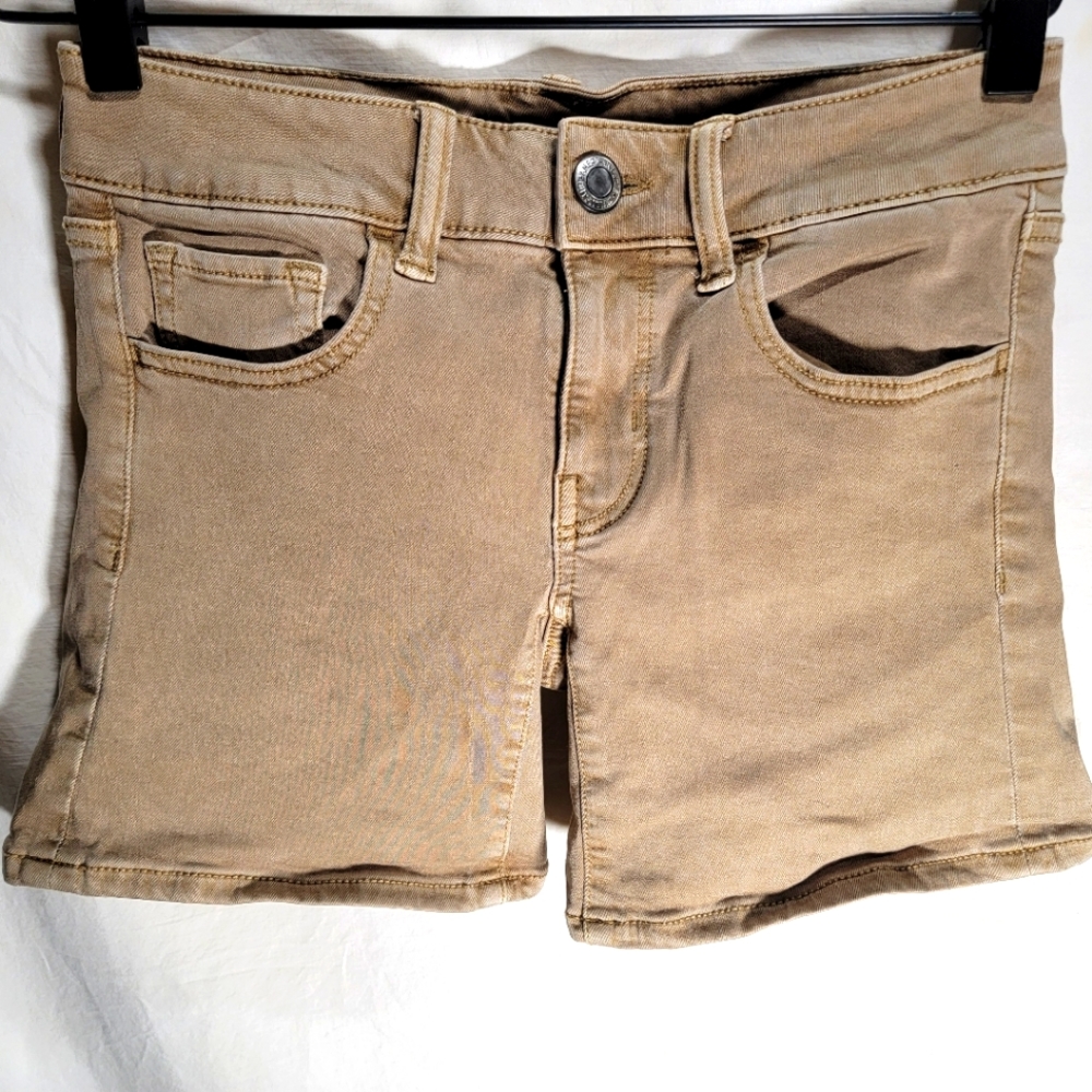 American Eagle Outfitters tan midi super stretch size 0 shorts in great shape.